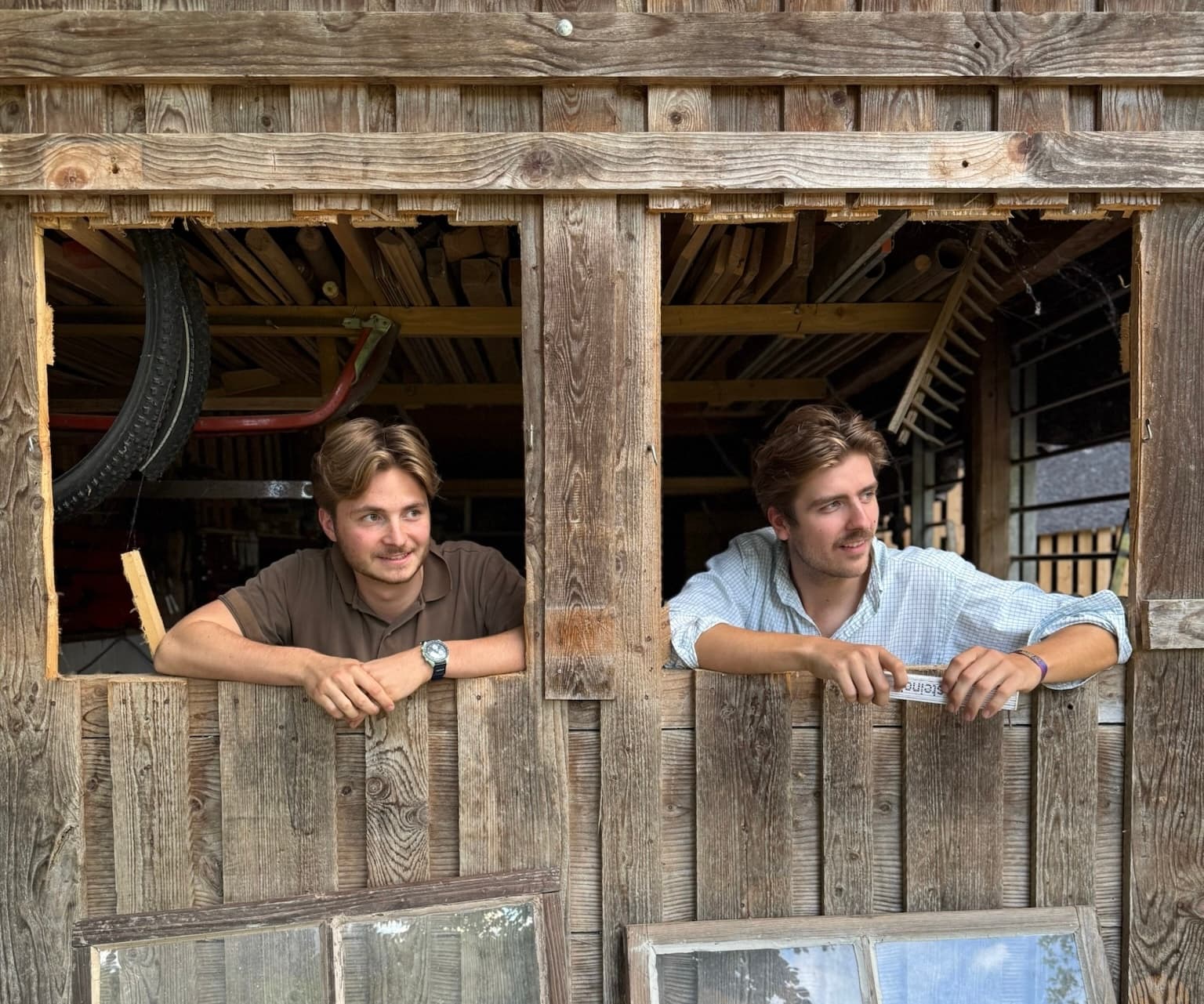 Caspari & Stelzer — three founders together in a warm, natural-light setting